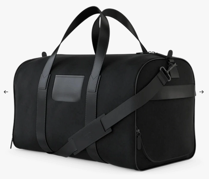 Czarna torba podróżna ze skórzanymi elementami